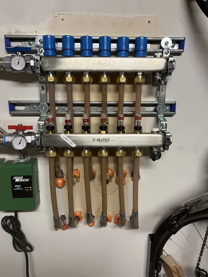 Plumber performing Leak Detection at a residential property in Wolcott